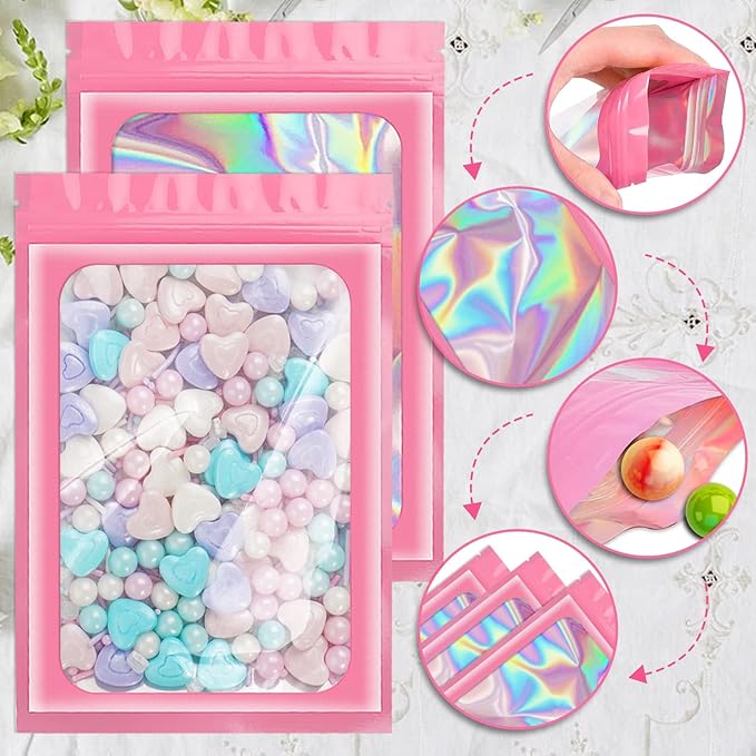 ANZNKU 100 Pcs Smell Proof Mylar Resealable Bags, Holographic Packaging Bags, Resealable Odor Foil Pouch Zip Bag with Clear Window for Food Storage and Lipgloss, Jewelry Lash(Pink, 4.7 x 7.9 Inch)