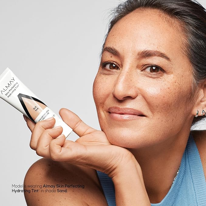 Almay Hydrating Liquid Foundation Tint, Lightweight with Light Coverage, Naturally Dewy Finish, Hypoallergenic, Dermatologist TestedFragrance Free, 130 Sand, 0.94 fl oz.